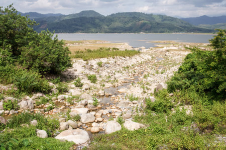 Large water reservoir among the mountains.の写真素材