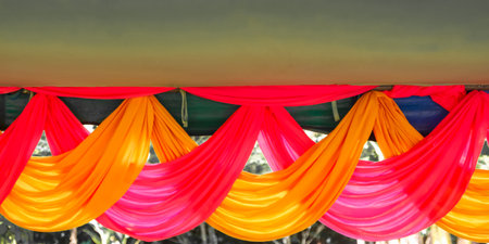 Colorful cloth hanging on the roof,Thai traditional style.の写真素材
