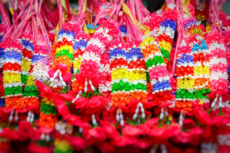Colorful flower garlands for worship in Buddhist temples, Thailand.の写真素材