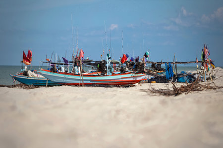 Fishing boats on the beach in Thailandの写真素材