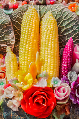 Corn and flowers made from candlesの素材