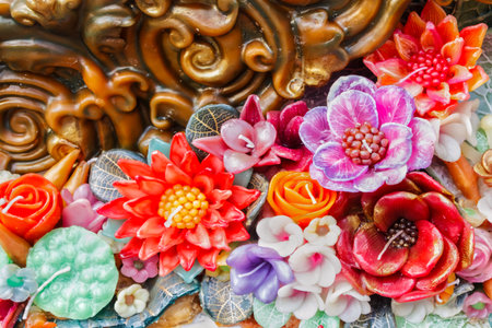 Thai style candle wax carving in the form of a flower.の写真素材