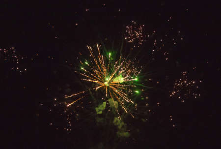 A photo of a salute in the night sky. Bright texture of festive fireworks. Abstract holiday...