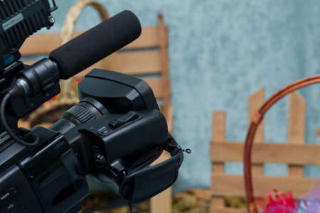 Video camera operator working with his equipmentの写真素材