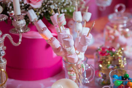 Dessert table for a party. Marshmallow skewers Candy Barの写真素材