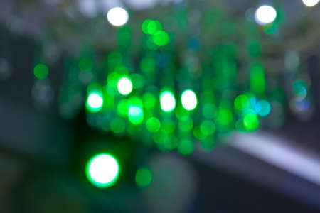 Green lights background . bokeh glitter vintage lights background defocusedの写真素材