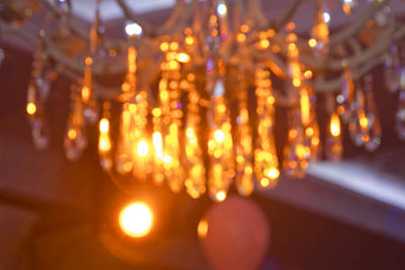 Yellow abstract background . Yellow and gold bokeh glitter vintage lights background defocusedの写真素材