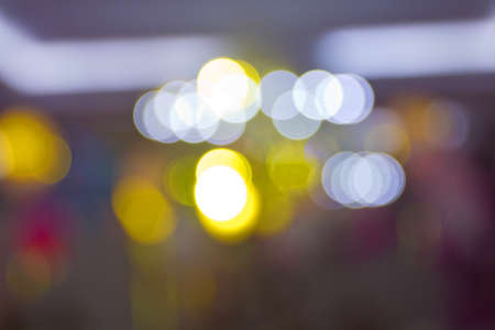 Yellow abstract background . Yellow and gold bokeh glitter vintage lights background defocused