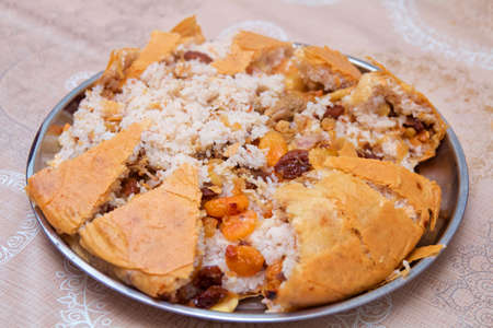 Traditional oriental dish, Khan pilaf in a pita on tableware in a restaurant in Azerbaijanの写真素材