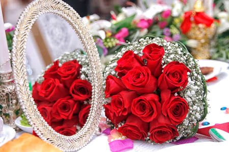 A bouquet of red roses at wedding.の写真素材