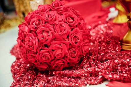 Round artificial red rose bouquet for engagement .の写真素材