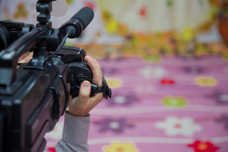 Video camera operator working his equipment video, camera, media,の写真素材