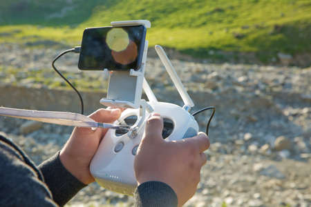 Drone quad copter with high resolution digital camera on the sky