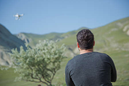 Drone quad copter with high resolution digital camera on the skyの写真素材