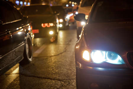 Night view of the cars. the night with yellow and red electrical light for cars during they are...