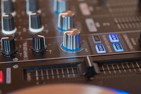 DJ booth at night club party for music mixing.