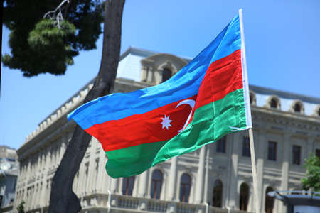 Azerbaijan flag in Baku, Azerbaijan. National sign background. Red Green Blue flag. Azerbaijan...