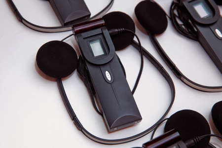 A set of headphones for simultaneous translation during negotiations in foreign languages....