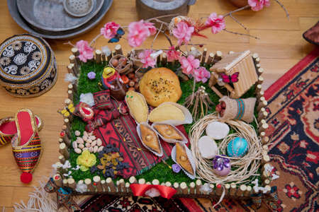 Azerbaijani sweetness baklava in homemade for the holiday Novruz . Black raisins, white raisins....