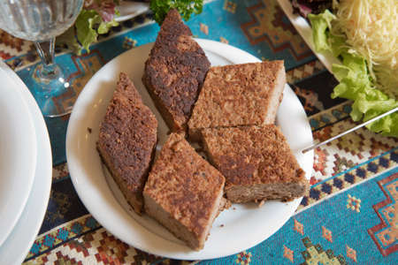 Baked cake in baklava form . Baklava on a plate turkish baklava on a plate .