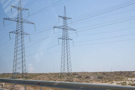 Electricity transmission power lines High voltage tower . Power line high voltage post with blue sky...