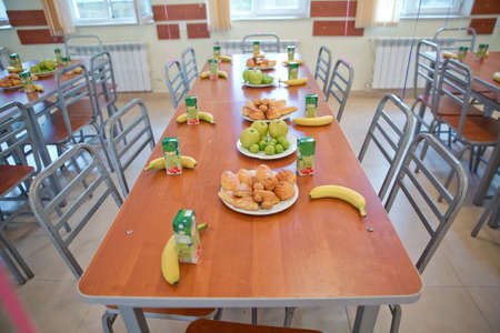 Food aid for orphans . kids eating lunch in a social school orphanage,population are orphans,due ....
