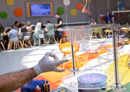 Soap bubbles show. Children's party. To burst the soap bubble