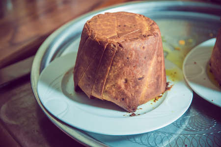 Shah pilaf. Khan pilaf in a pita. Traditional oriental dish . on tableware . Azerbaijan , Baku ....