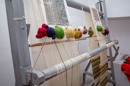 Dyed Threads to be Used For Weaving Azerbaijan Carpets . Various yarn on weaving handmade carpet ....