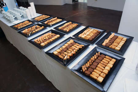 black yellow square cake .cakes baked in a pod. Coffee break breakfast at the hotel.Luxury hotel...
