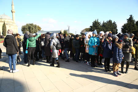 Azerbaijan, Baku, January 18, 2020. People visiting Alley of Martyrs on anniversary of 20th January tragedy when Soviet Army attacked Baku in 1990, killing 137 people, wounding 744のeditorial素材