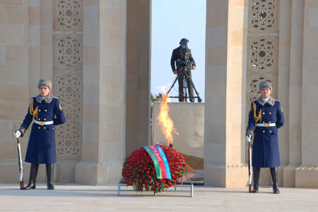 BAKU, AZERBAIJAN - JANUARY 20 2009 Flowers laid in respect by mourners on marble graves at the 20th...