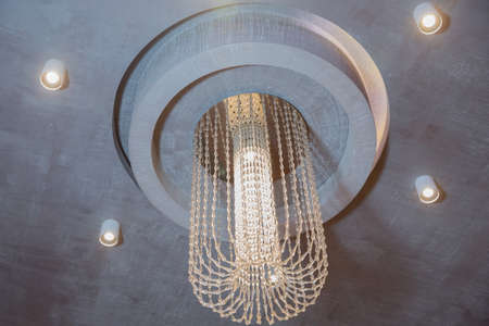 Round ceiling lamp ,Modern hanging lighting fixtures.Decorative round chandelier in dining room at...