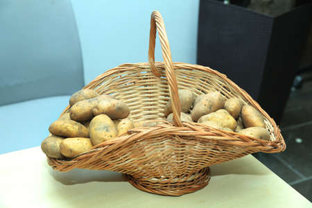 The basket is not boiled in Potatoes . Fried potatoes in a wooden bowlの写真素材