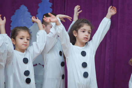 Baku, Azerbaijan . 26.01.2020 . The children are dressed as snowmen. Kindergarten participants take part in a New Year's event. Cute boys dressed in festive costumes of Santa Claus and snowmenのeditorial素材