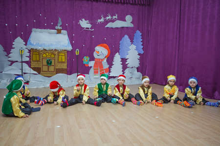 Baku, Azerbaijan . 26.01.2020 . The children are dressed as red Santa Claus. Kindergarten participants take part in a New Year's event. Cute boys dressed in festive costumes of red Santa Clausのeditorial素材