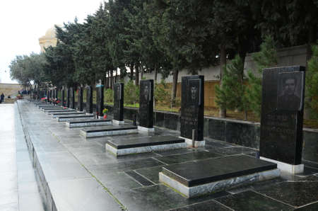 Azerbaijan, Baku: 13.11.2014 . People and The tourists visiting Alley of Martyrs on anniversary of 20th January tragedy when Soviet Army attacked Baku in 1990, killing 137 people, wounding 744 .のeditorial素材