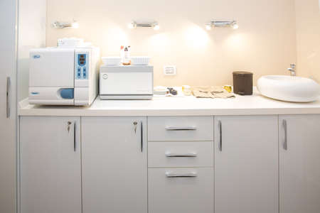 Azerbaycan Baku. 25.09. 2018 . Runyes Autoclave dentistry . DENTAL AUTOCLAVE BENCHTOP . Towel warmer - COMED UV sterilizer IONTO Hot Cabi . Sunshine DEntal . Dentistry and Cosmetic Dentistry Clinicのeditorial素材