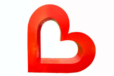 close up red heart shape symbol on white background  . A red heart isolated on white background ....