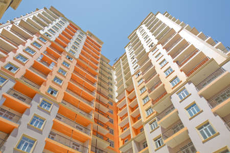 Azerbaijan Baku 04.08, 2017. Facade of modern multi-storey new residential orange building near Baku...