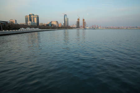 Caspian Sea coast in Baku . Panoramic view of the Caspian Sea in Baku. Panoramic view of Baku, Azerbaijan, skyline with historical and modern architecture. A bird's-eye view.の写真素材