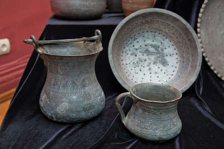 Azerbaijan Baku 04.12.2020 . Various amphorae exhibited in the national arcaeological museum . Copper pottery exhibition . Satilのeditorial素材