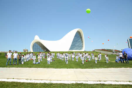 BAKU, AZERBAIJAN - JUNE 1 2019 : Kids festival . In park of Heydar Aliyev Center. Kids show a karate show at the festivalのeditorial素材