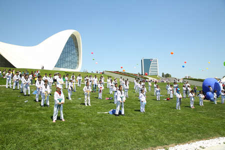 BAKU, AZERBAIJAN - JUNE 1 2019 : Kids festival . In park of Heydar Aliyev Center. Kids show a karate show at the festivalのeditorial素材