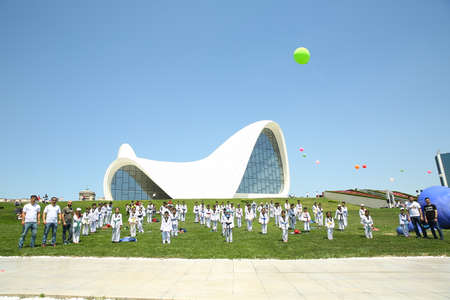BAKU, AZERBAIJAN - JUNE 1 2019 : Kids festival . In park of Heydar Aliyev Center. Kids show a karate show at the festivalのeditorial素材