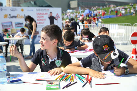 BAKU, AZERBAIJAN - JUNE 1 2019 : Kids festival . In park of Heydar Aliyev Center. Children paintingのeditorial素材