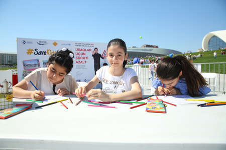 BAKU, AZERBAIJAN - JUNE 1 2019 : Kids festival . In park of Heydar Aliyev Center. Children paintingのeditorial素材
