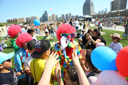 BAKU, AZERBAIJAN - JUNE 1 2019 : Kids festival . In park of Heydar Aliyev Center. Clowns hold shows for children'sのeditorial素材
