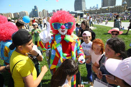 BAKU, AZERBAIJAN - JUNE 1 2019 : Kids festival . In park of Heydar Aliyev Center. Clowns hold shows for children'sのeditorial素材
