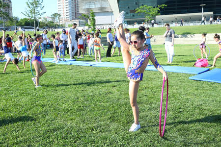 BAKU, AZERBAIJAN - JUNE 1 2019 : Kids festival . In park of Heydar Aliyev Center. Children show gymnastics showのeditorial素材